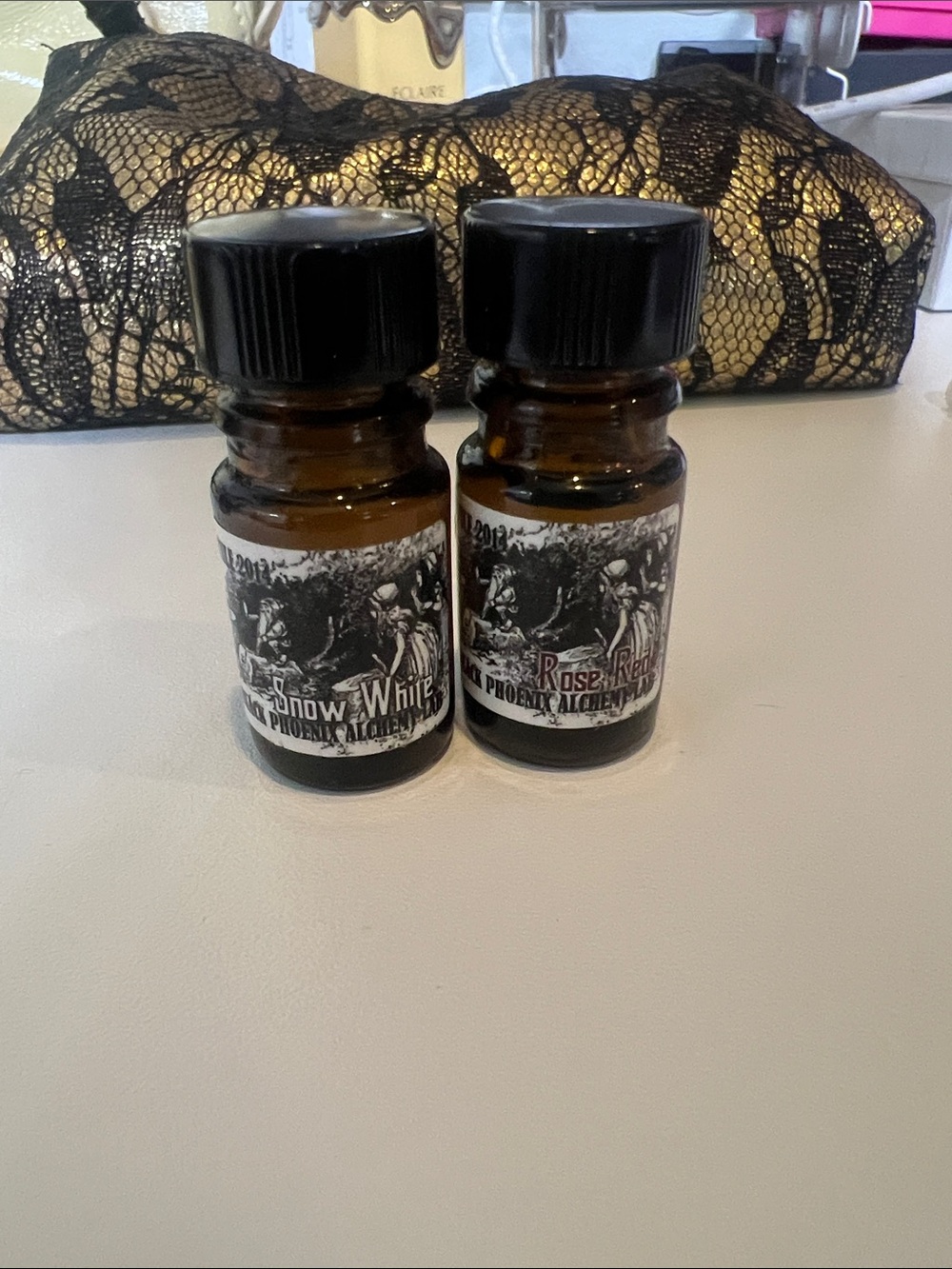 Black Phoenix Alchemy Lab Yule 2014 Snow White and Rose Red Perfume Oils